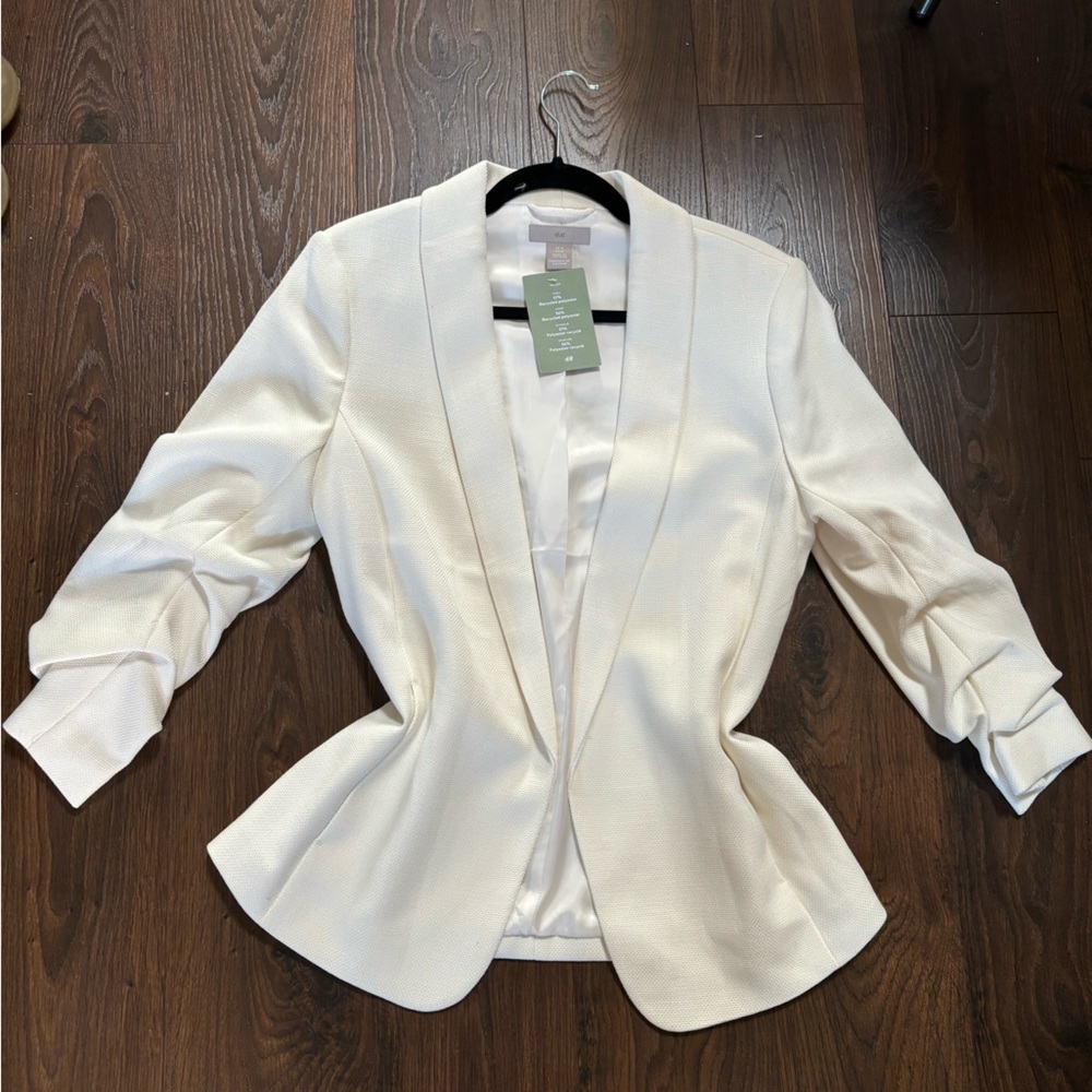 white blazer with ruches sleeves